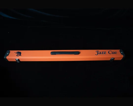 Orange JazzCue hard cue case on a black studio background